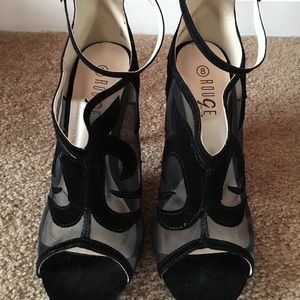 Black heel with sheer cut out